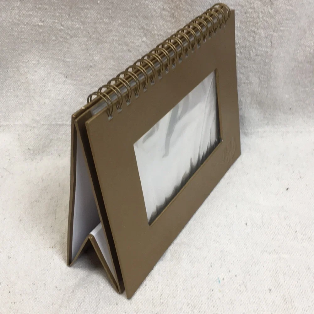 Spiral bound Olympic photo album/frame